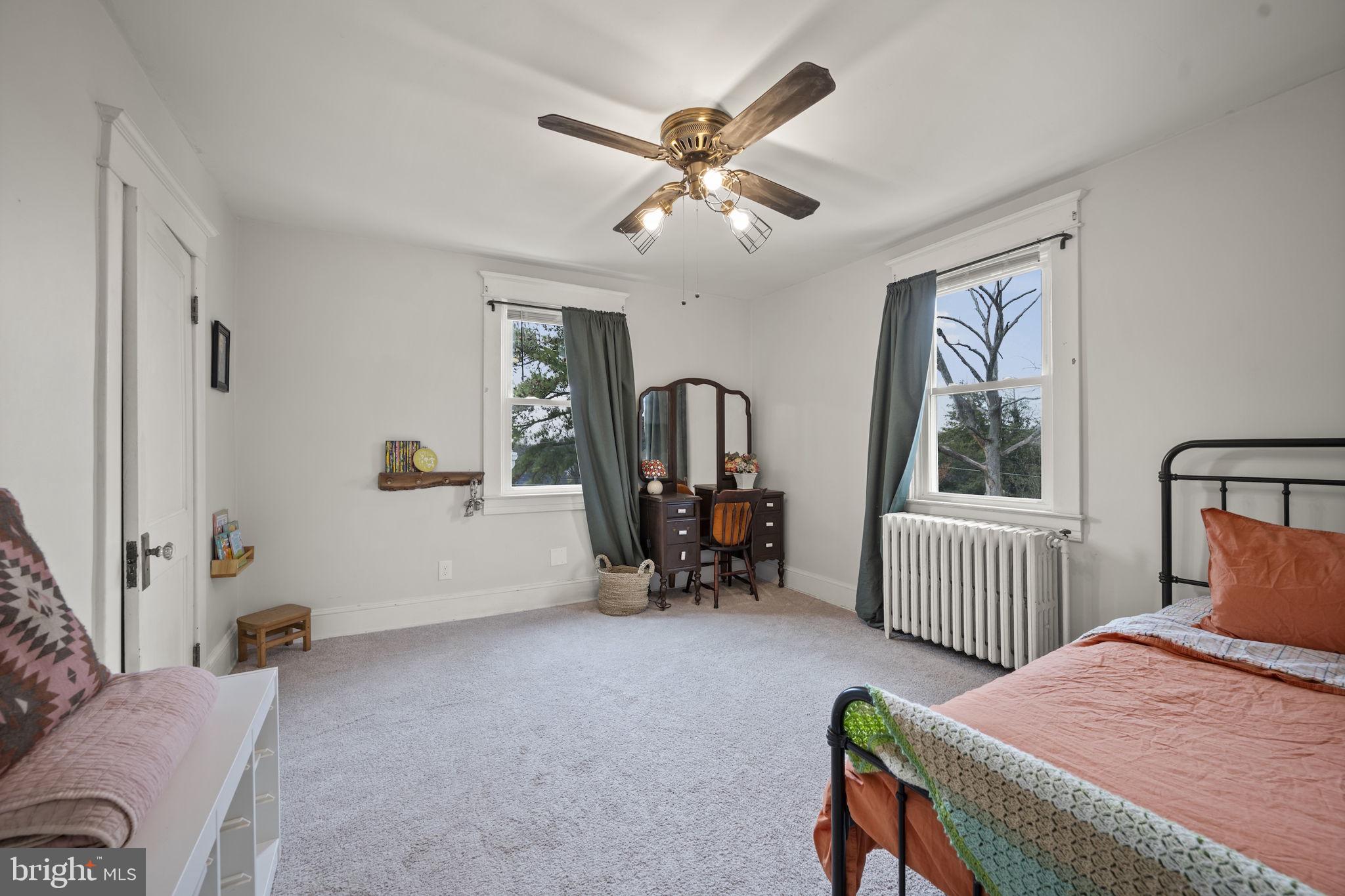 4 Elinor Avenue Baltimore, MD 21236 - Photo 19 of 47 a bedroom with bed and a window