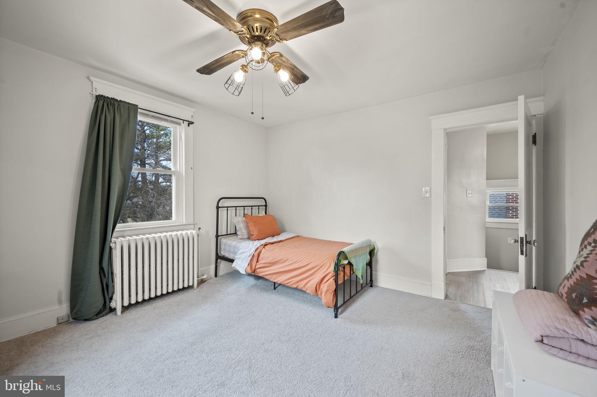 4 Elinor Avenue Baltimore, MD 21236 - Photo 20 of 47 a bedroom with furniture and windows