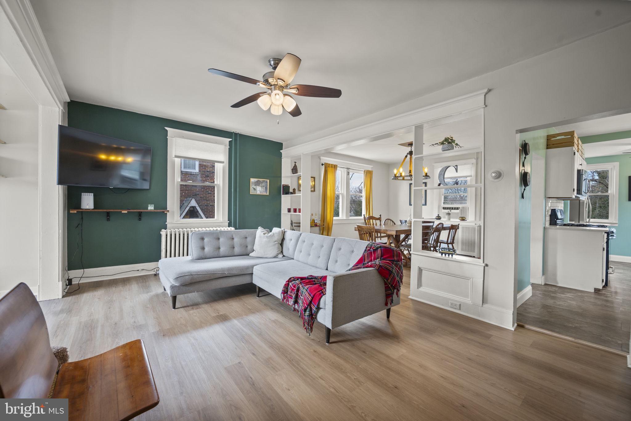 4 Elinor Avenue Baltimore, MD 21236 - Photo 2 of 47 a living room with furniture and a wooden floor