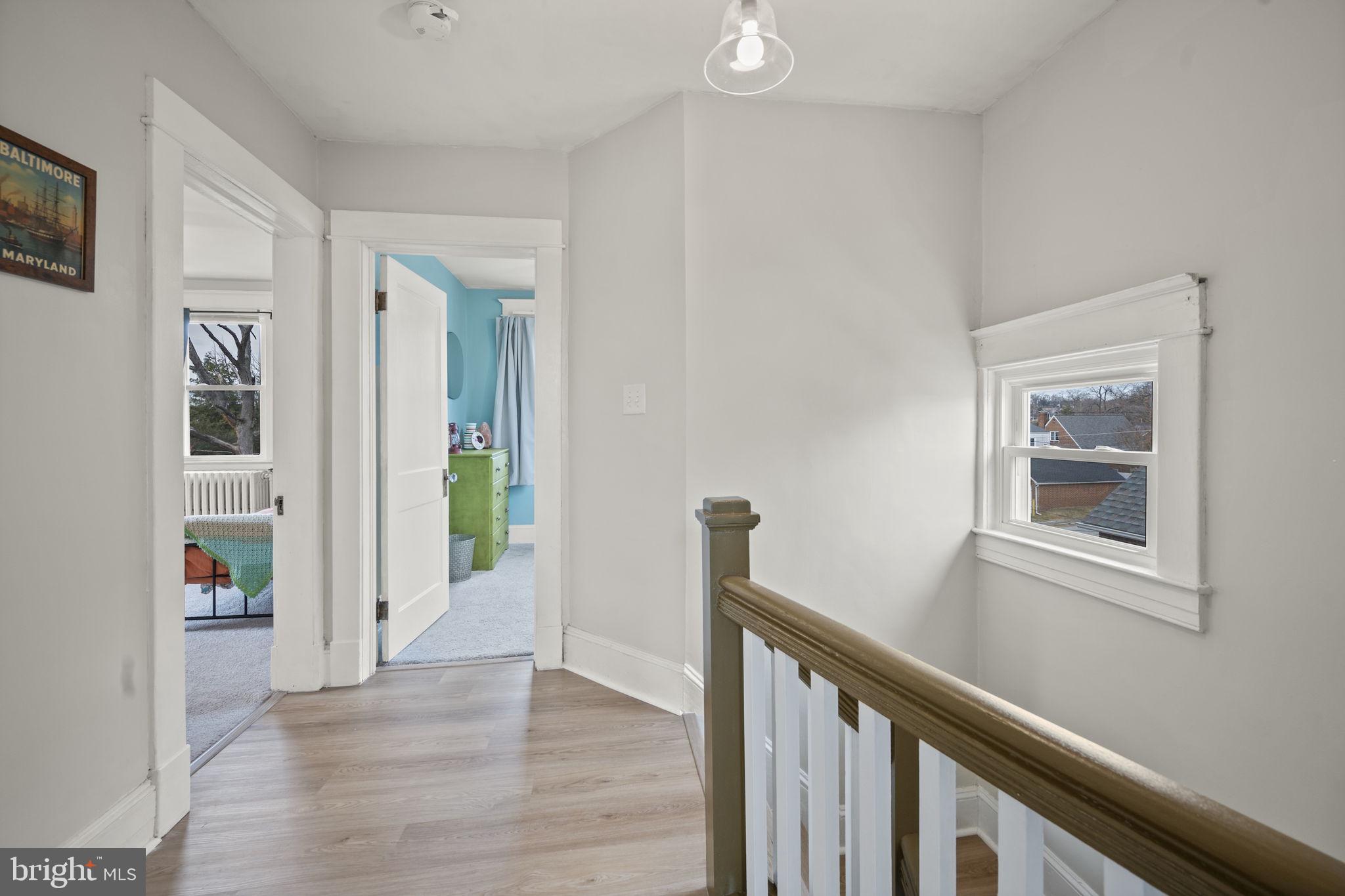 4 Elinor Avenue Baltimore, MD 21236 - Photo 24 of 47 a view of an entryway with wooden floor and a window