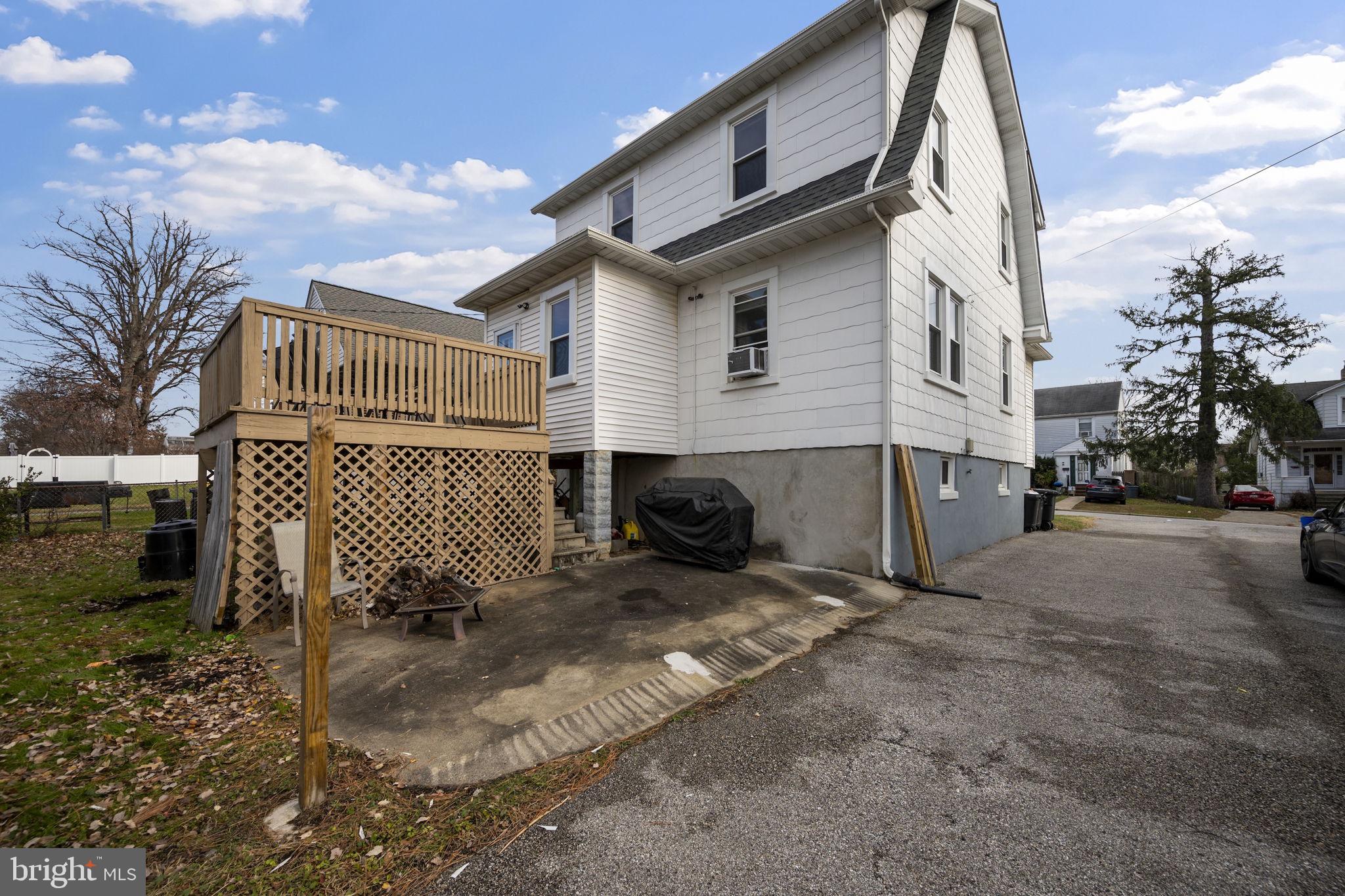 4 Elinor Avenue Baltimore, MD 21236 - Photo 41 of 47 a view of a house with backyard and a tree