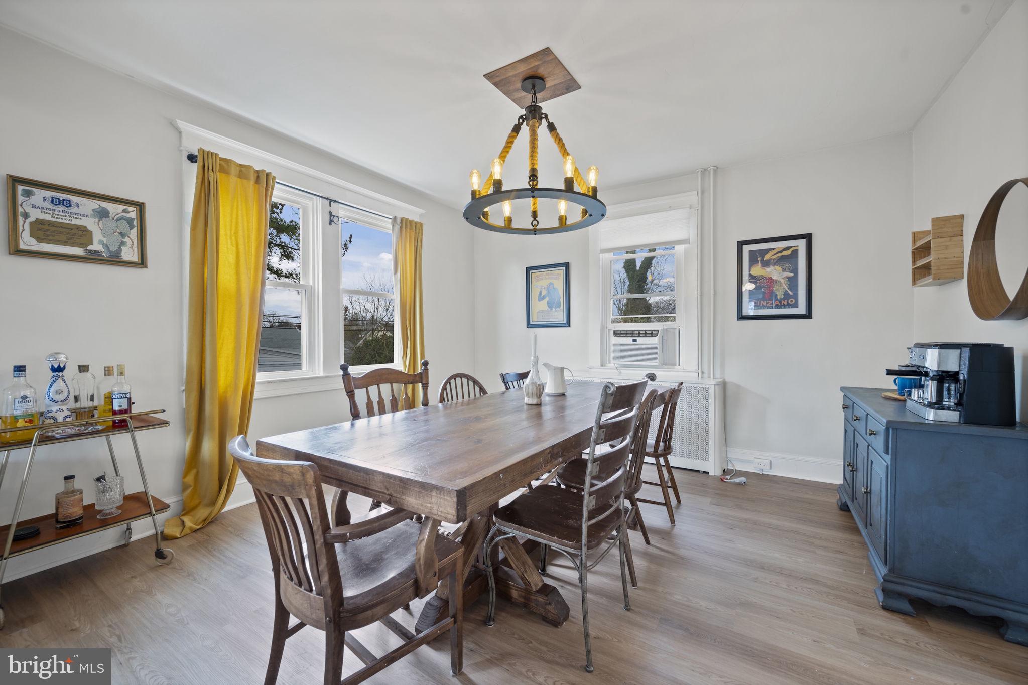 4 Elinor Avenue Baltimore, MD 21236 - Photo 9 of 47 a dining room with wooden floor and breakfast area
