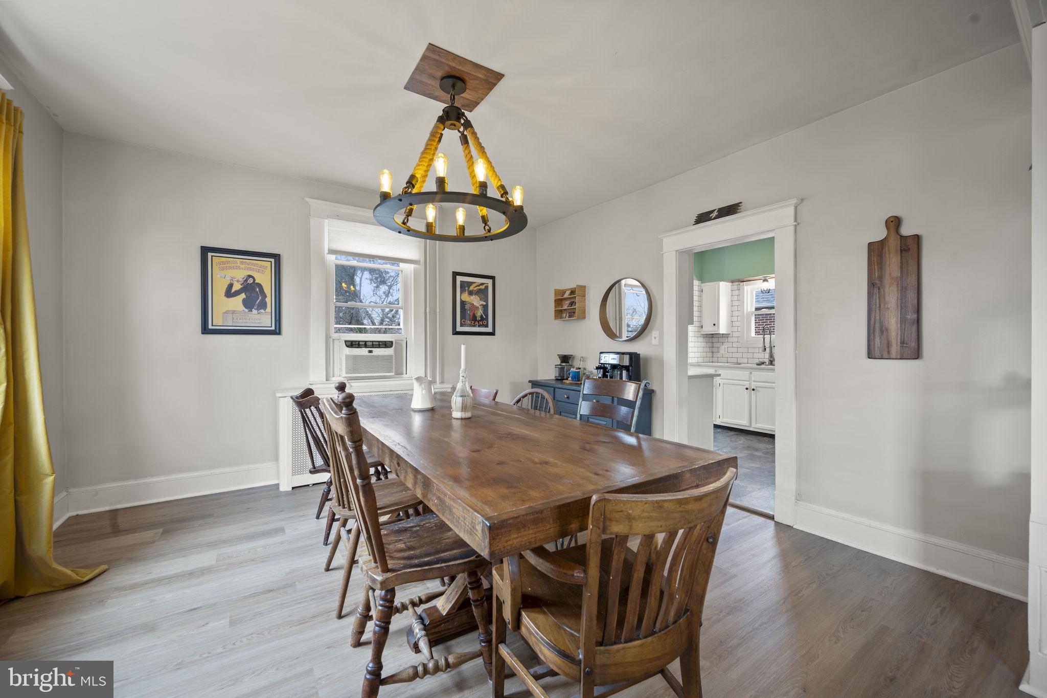 4 Elinor Avenue Baltimore, MD 21236 - Photo 10 of 47 a view of a dining room with furniture and chandelier