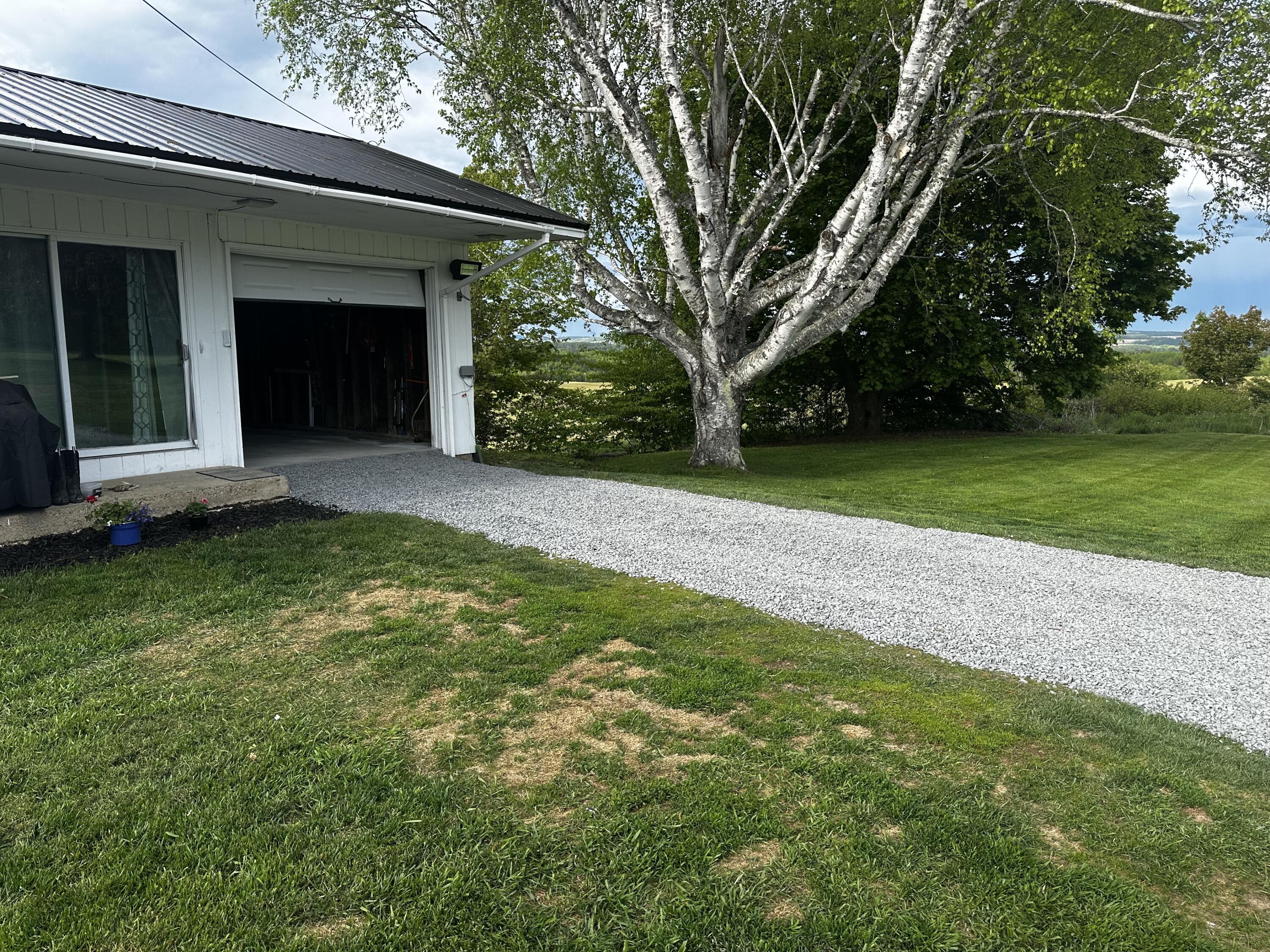 55 Old Houlton Road Bridgewater, ME 04735 - Photo 4 of 61 garage drive
