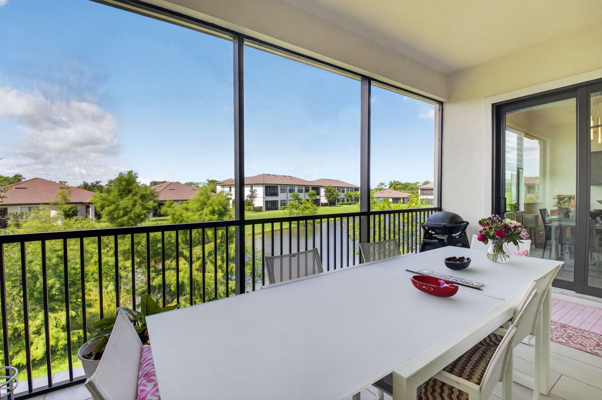 21956 Canadensis Circle, Unit 201 Boca Raton, FL 33428 - Photo 29 of 37 Screened Lanai