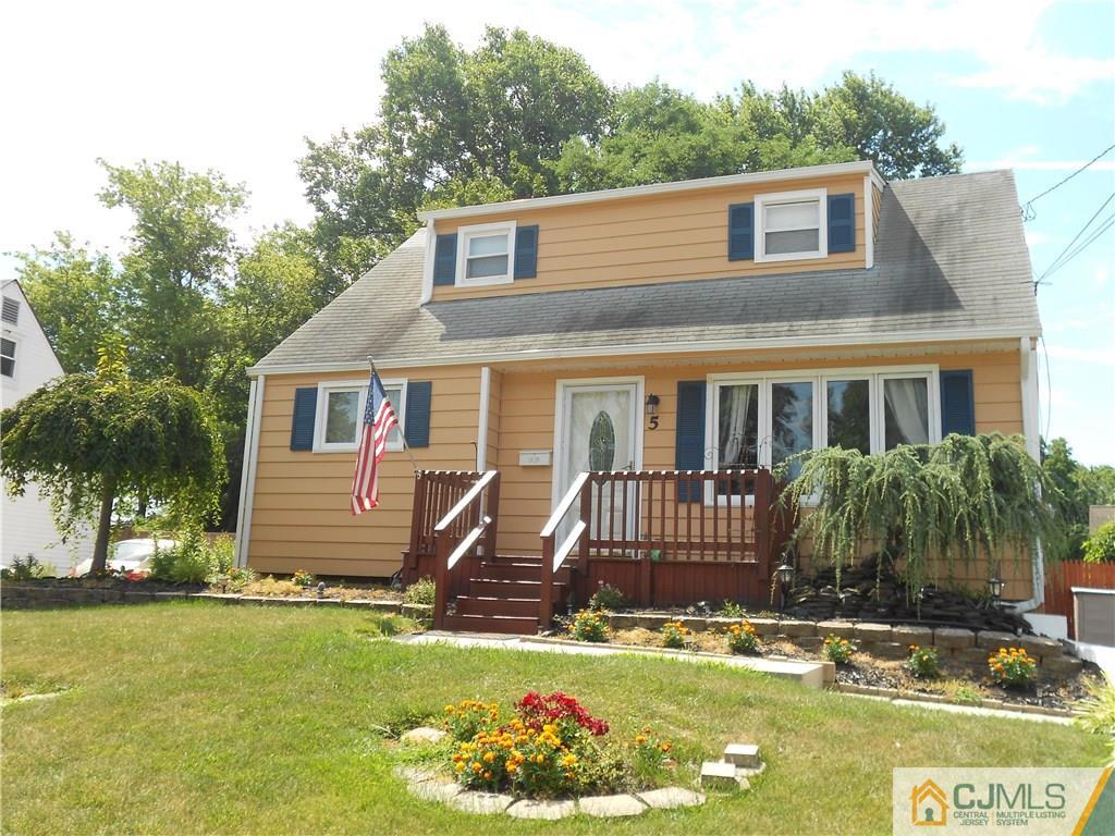 5 Kendall Road East Brunswick, NJ 08816 - Photo 1 of 12 a front view of a house with a garden