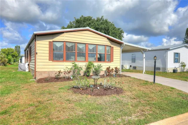 $169,000 | 705 Hyacinth Circle, Barefoot Bay, FL 32976