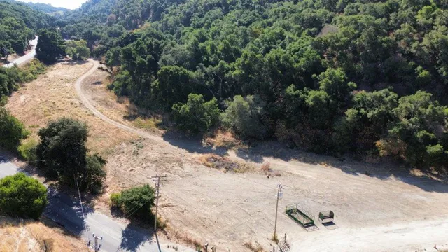 a view of a backyard of a house