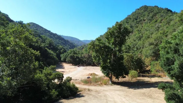 a view of a snow on the side of the road