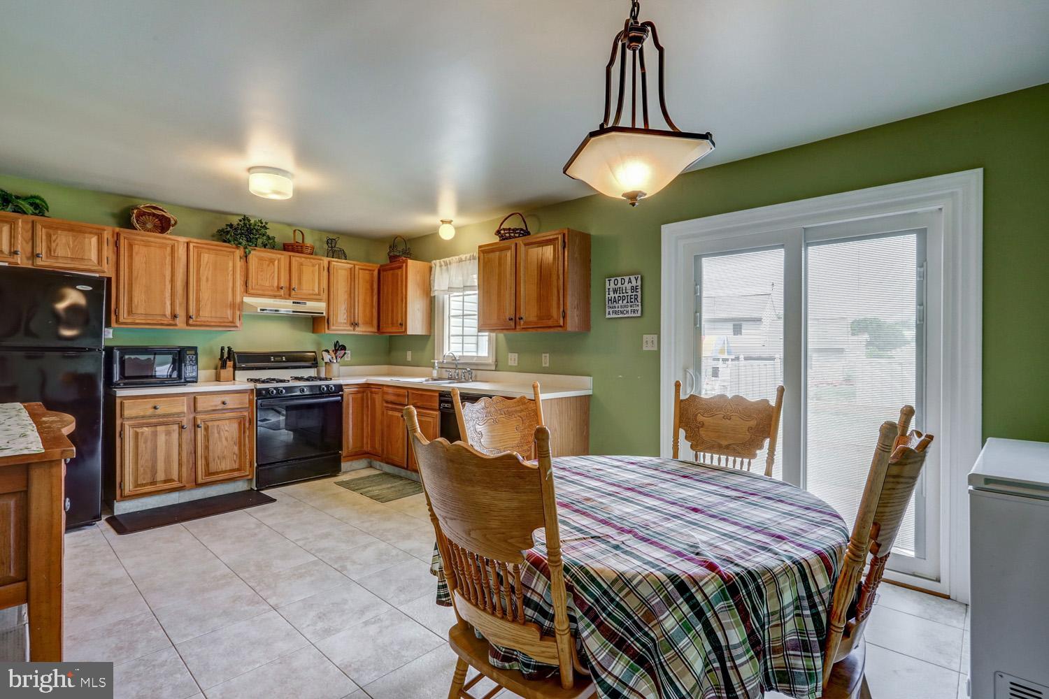 82 Robinhill Drive Lititz, PA 17543 - Photo 15 of 31 Large kitchen with access to deck