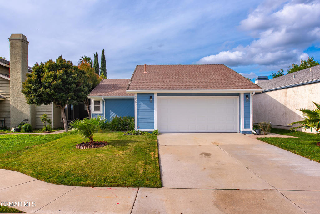 2497 Orangewood Place Simi Valley, CA 93065 - Photo 1 of 42 a front view of a house with a garden and plants