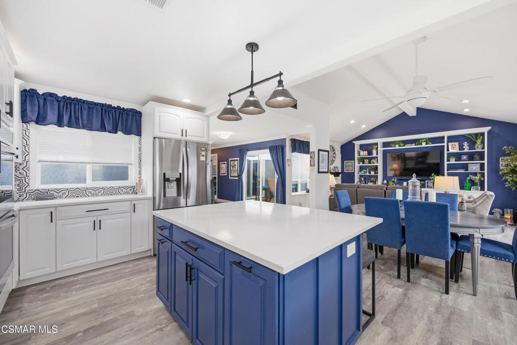 2497 Orangewood Place Simi Valley, CA 93065 - Photo 13 of 42 a large kitchen with a table and chairs
