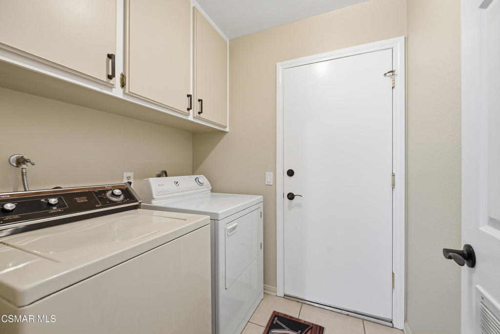 2497 Orangewood Place Simi Valley, CA 93065 - Photo 24 of 42 a utility room with dryer and washer