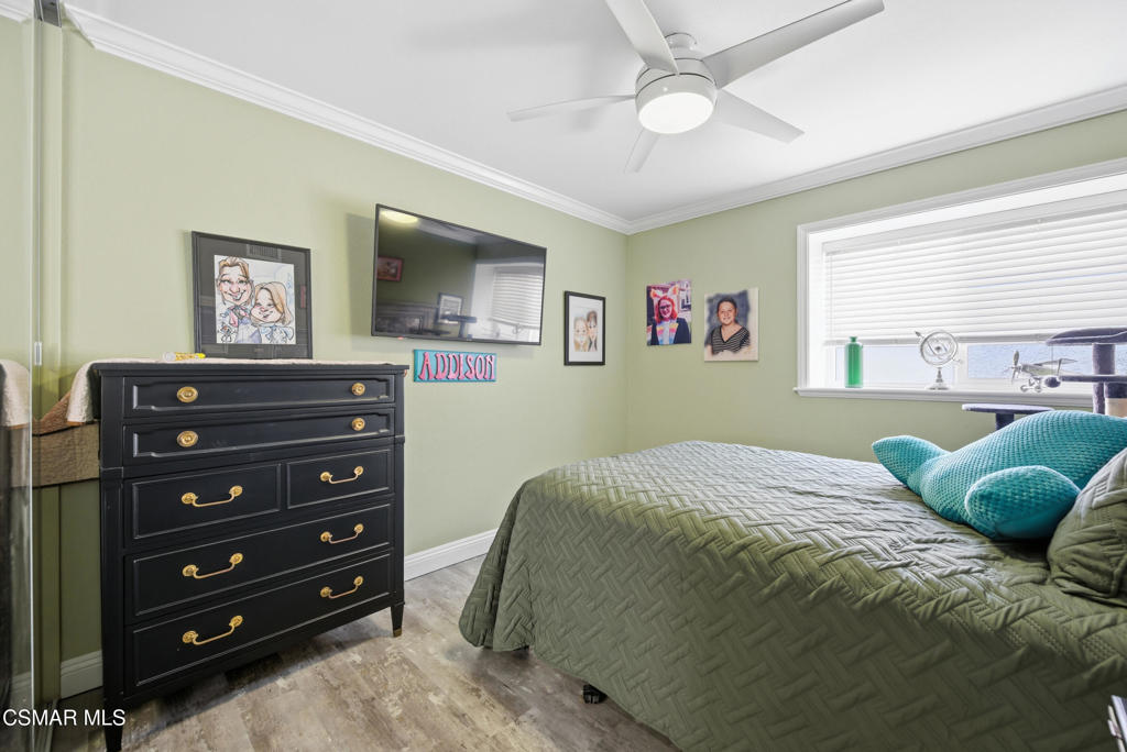 2497 Orangewood Place Simi Valley, CA 93065 - Photo 26 of 42 a bedroom with a bed and a dresser