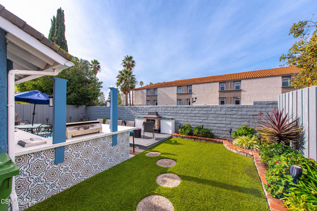 2497 Orangewood Place Simi Valley, CA 93065 - Photo 29 of 42 a view of backyard with outdoor seating and plants