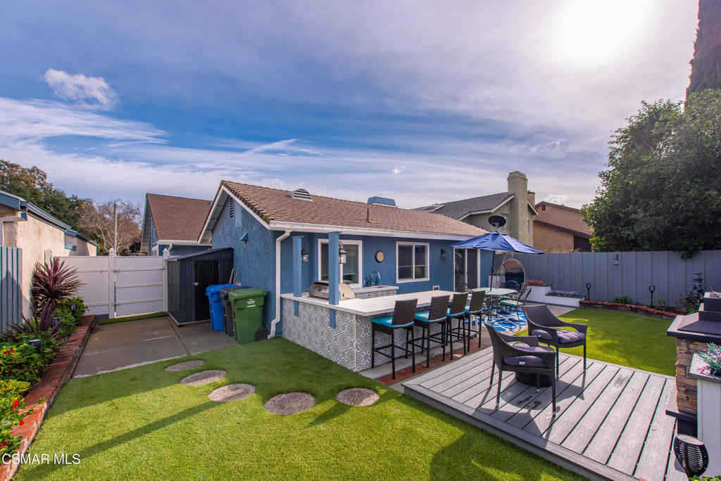 2497 Orangewood Place Simi Valley, CA 93065 - Photo 30 of 42 a view of a house with backyard porch and sitting area