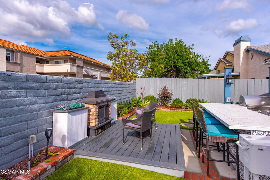 2497 Orangewood Place Simi Valley, CA 93065 - Photo 35 of 42 a view of a table and chairs in patio of the house