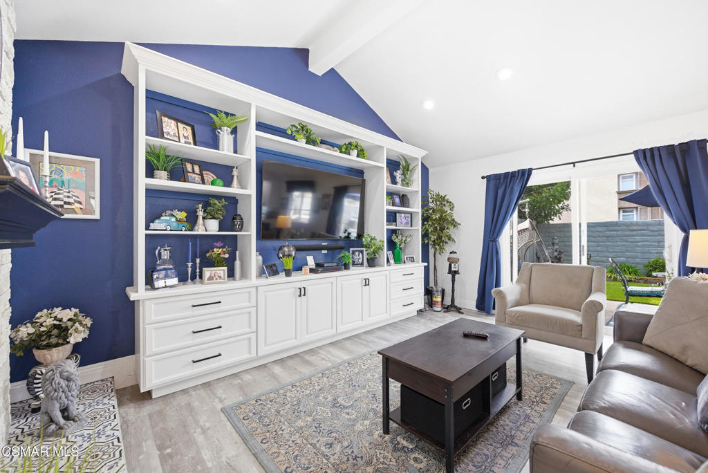 2497 Orangewood Place Simi Valley, CA 93065 - Photo 4 of 42 a living room with furniture and a flat screen tv