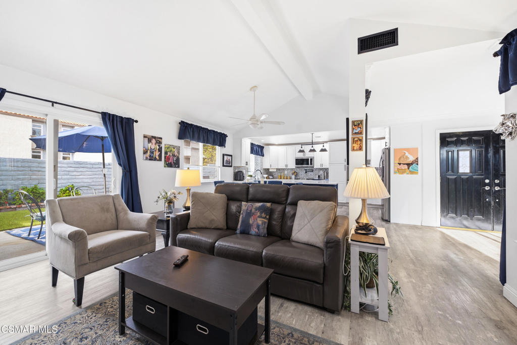 2497 Orangewood Place Simi Valley, CA 93065 - Photo 7 of 42 a living room with furniture and a large window