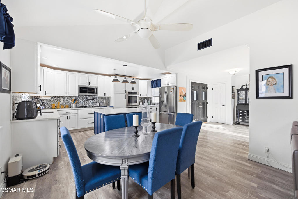 2497 Orangewood Place Simi Valley, CA 93065 - Photo 8 of 42 a view of a dining room with furniture and wooden floor