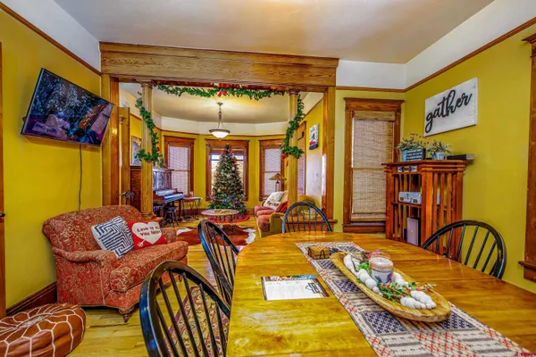 a living room with furniture and a rug