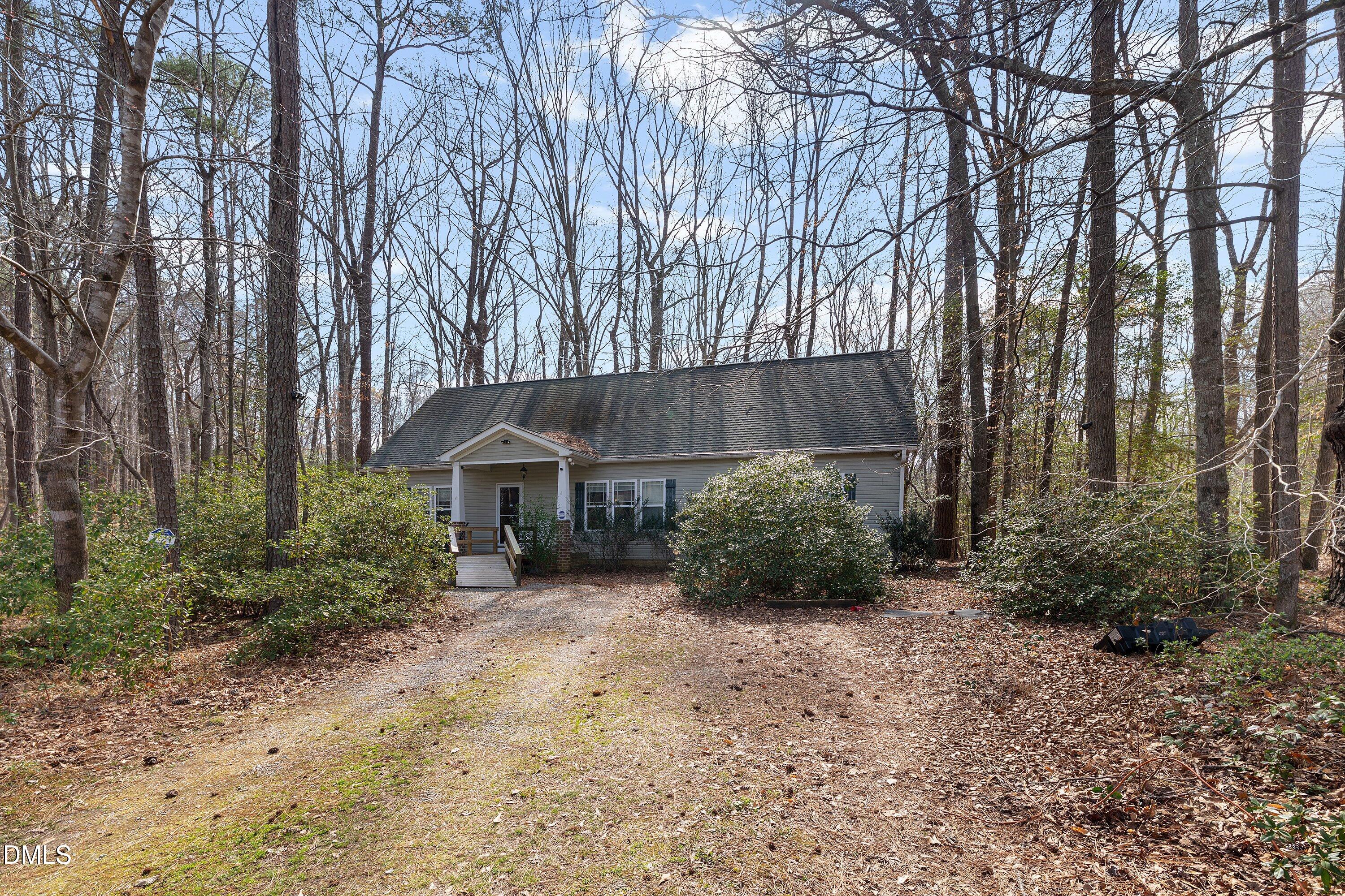 9713 Lake Wheeler Road Raleigh, NC 27603 - Photo 2 of 18 a view of backyard of house