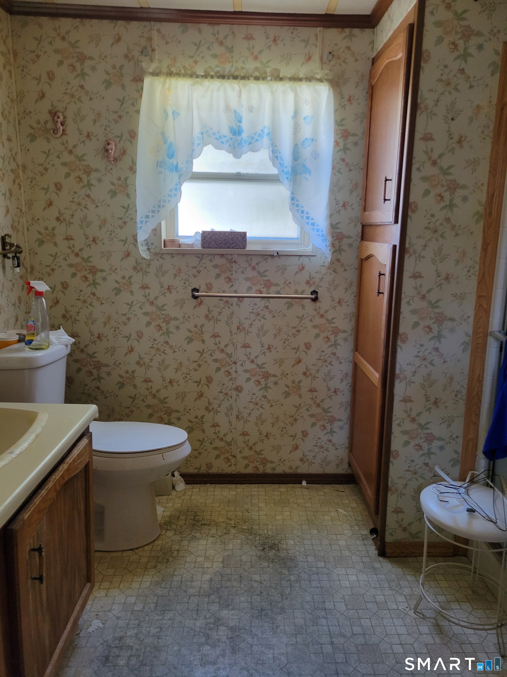 134 E Street Groton, CT 06340 - Photo 5 of 5 a bathroom with a toilet and a sink