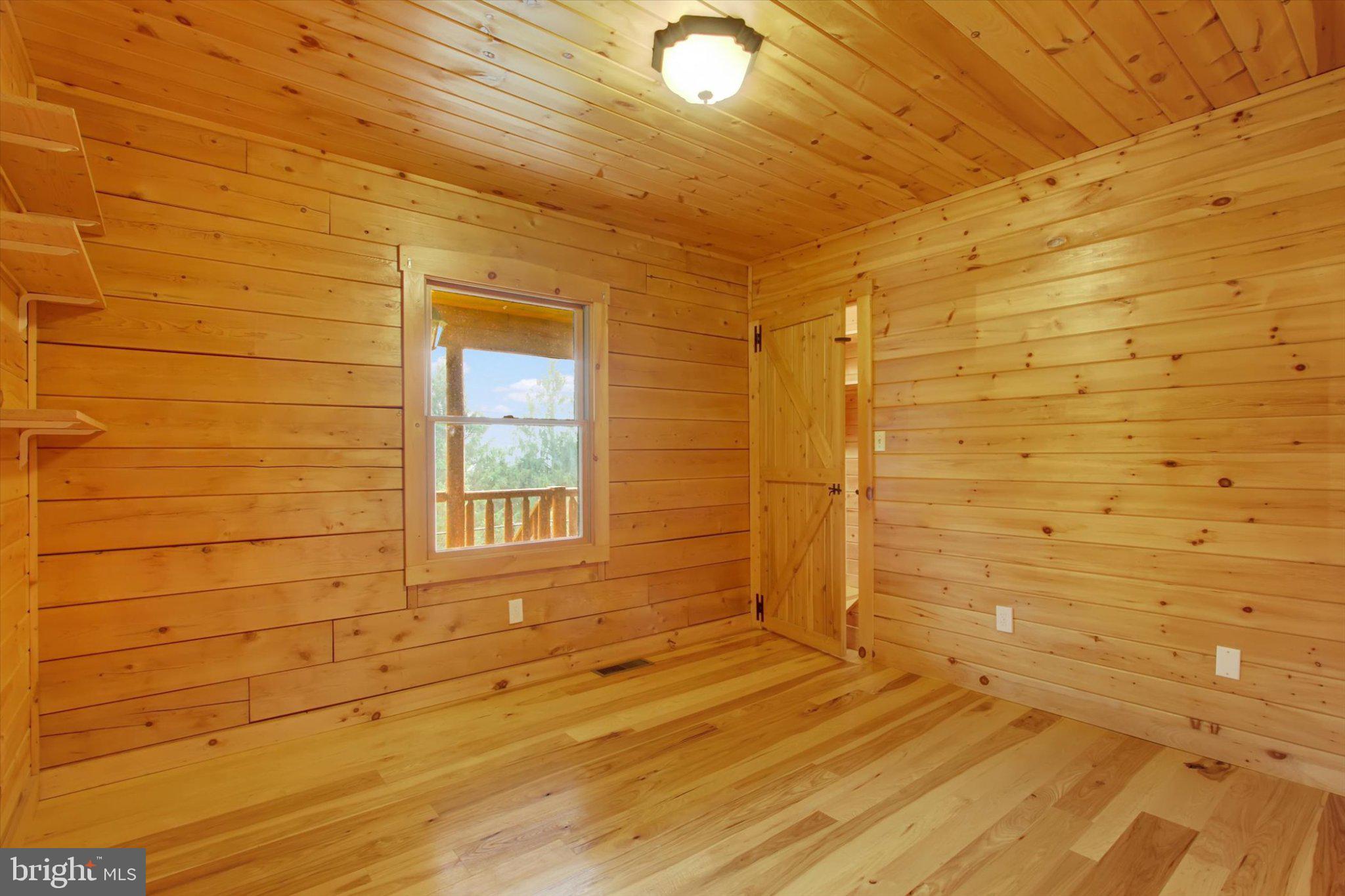 835 Jacks Mountain Road Fairfield, PA 17320 - Photo 17 of 39 Cozy wooden retreat with natural light.
