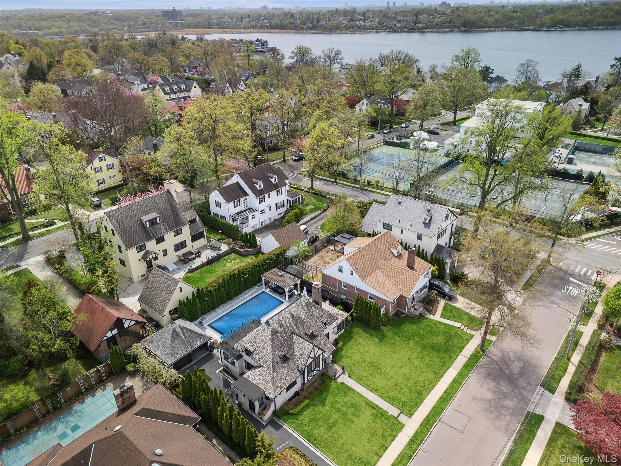 216 Beverly Road Queens, NY 11363 - Photo 43 of 50 an aerial view of a house with a lake view