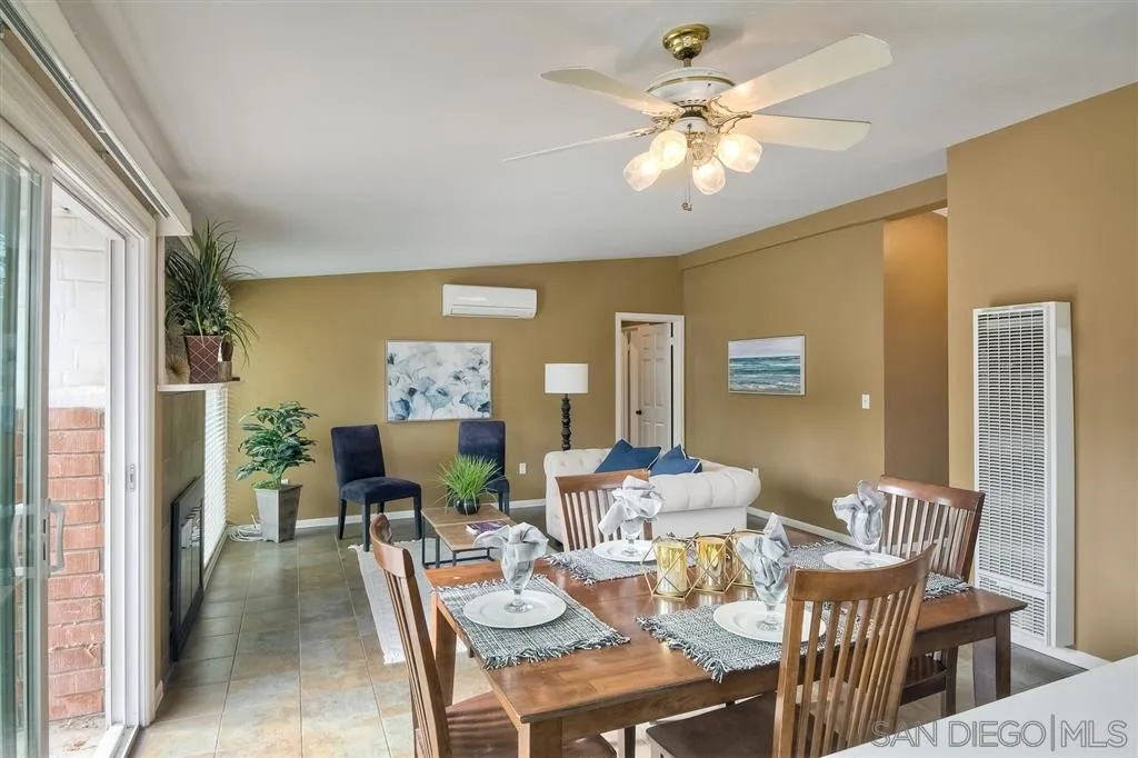 13733 Powers Road Poway, CA 92064 - Photo 12 of 23 a view of a dining room with furniture and chandelier