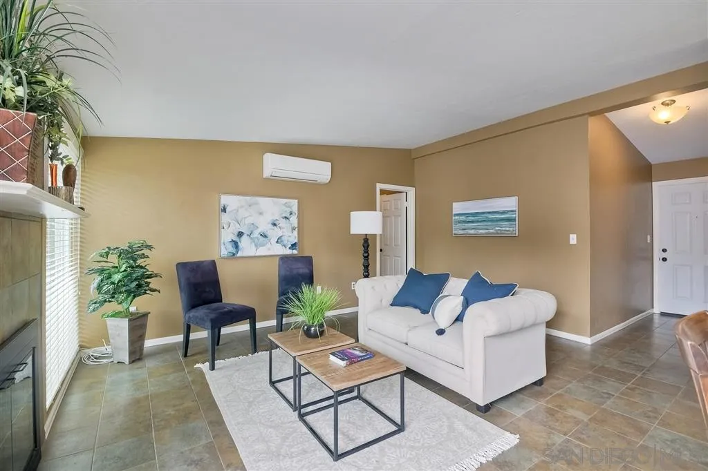 13733 Powers Road Poway, CA 92064 - Photo 5 of 23 a living room with furniture and a rug