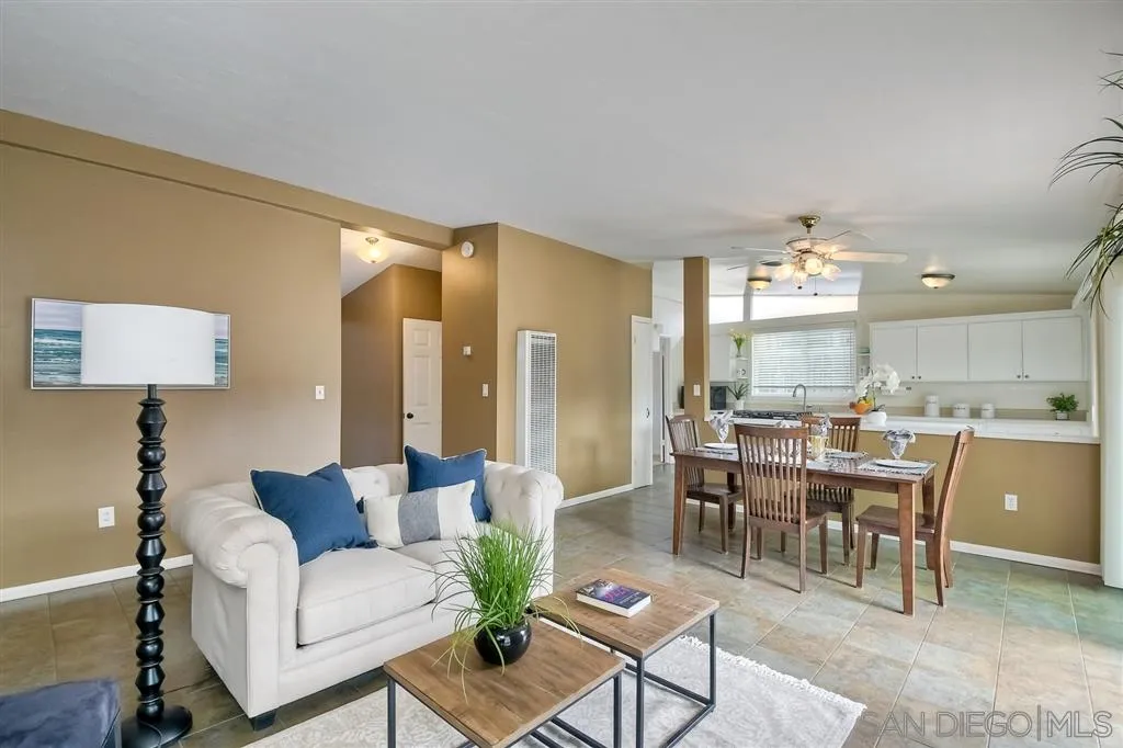 13733 Powers Road Poway, CA 92064 - Photo 6 of 23 a view of a dining room with furniture and chandelier