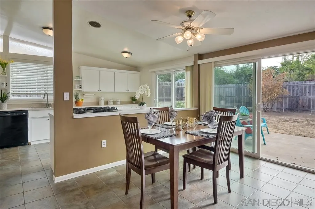 13733 Powers Road Poway, CA 92064 - Photo 7 of 23 a view of a dining room with furniture window and outside view