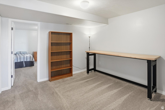 14820 175 East Draper, UT 84020 - Photo 24 of 39 Finished below grade area featuring light colored carpet and baseboards