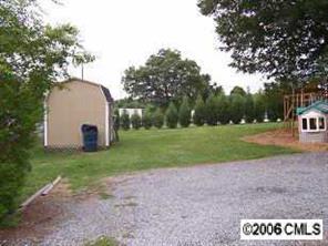 695 Sunderland Road Southwest Concord, NC 28027 - Photo 3 of 8 a view of a field