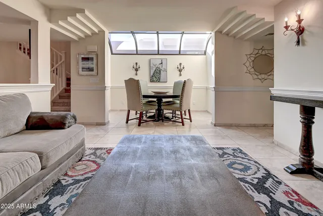 a view of a hallway with seating area