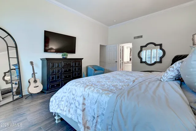 a bathroom with a double vanity sink and mirror