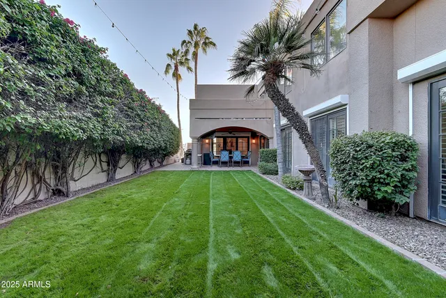 a view of yard from a corridor