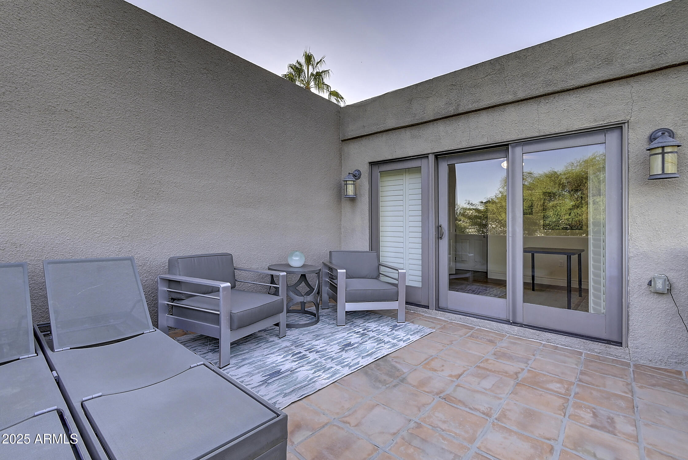 3050 East Marlette Avenue Phoenix, AZ 85016 - Photo 48 of 54 a living room with furniture and a floor to ceiling window