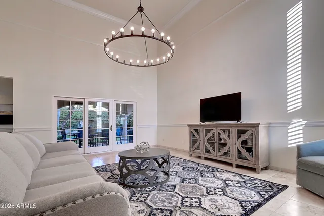 a living room with a couch and a table