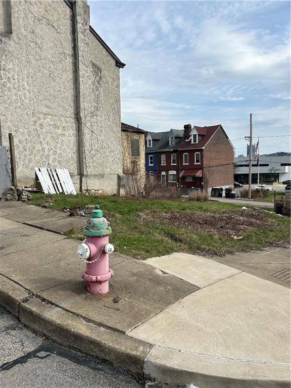 0 Kirkbride Pittsburgh, PA 15212 - Photo 6 of 8 a front view of a house with a yard and garage