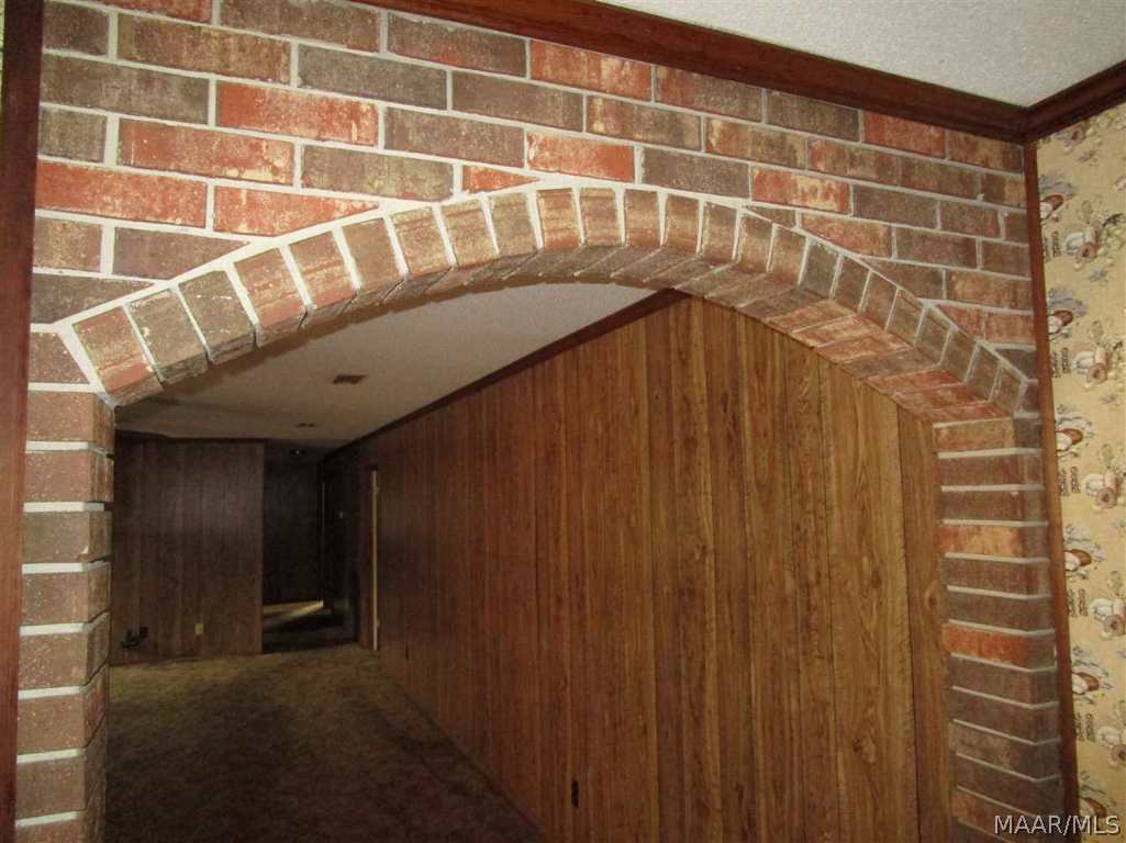 4434 Stephenson Road Coffee Springs, AL 36318 - Photo 4 of 36 Brick wall between kitchen and family room