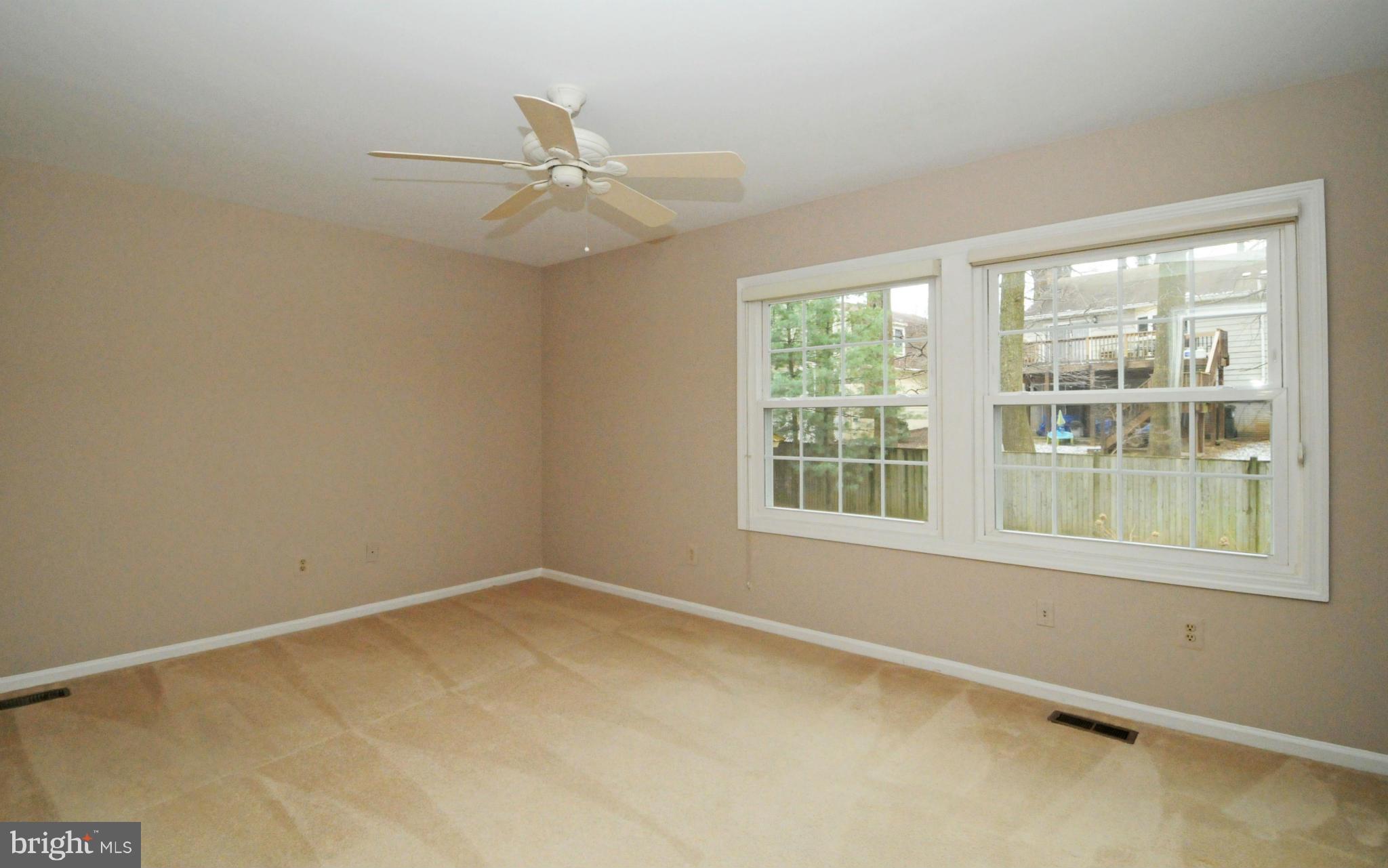 8425 Blevins Way Court Vienna, VA 22182 - Photo 18 of 30 an empty room with a window