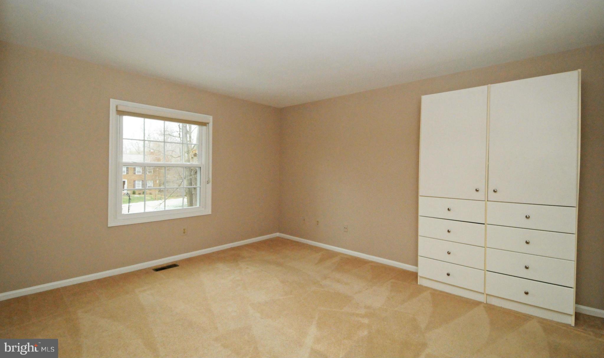 8425 Blevins Way Court Vienna, VA 22182 - Photo 22 of 30 a view of an empty room with a window