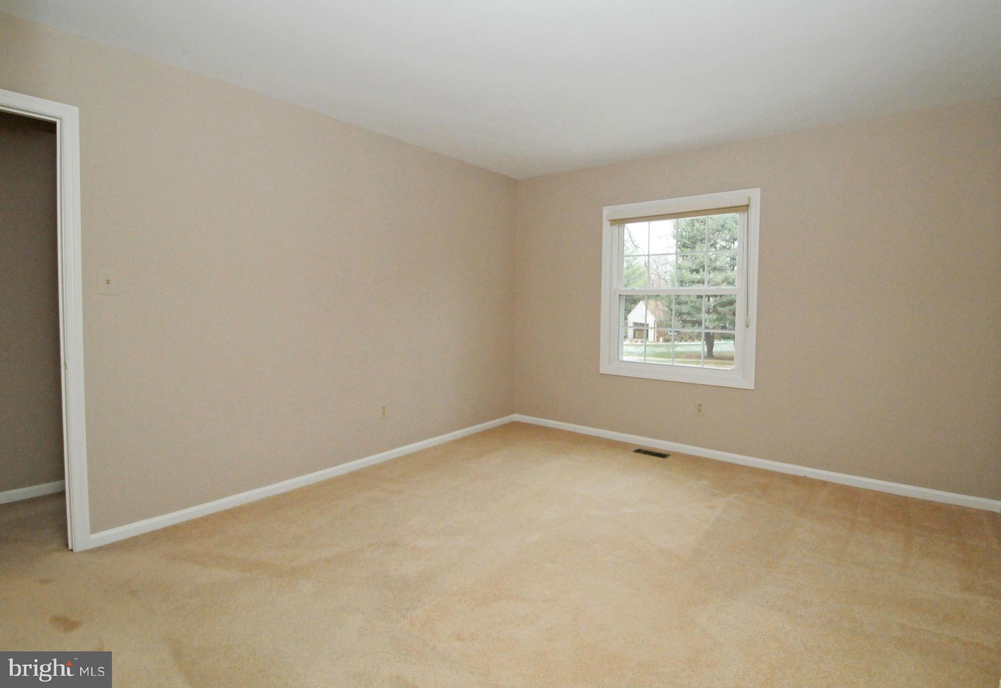8425 Blevins Way Court Vienna, VA 22182 - Photo 23 of 30 an empty room with a window