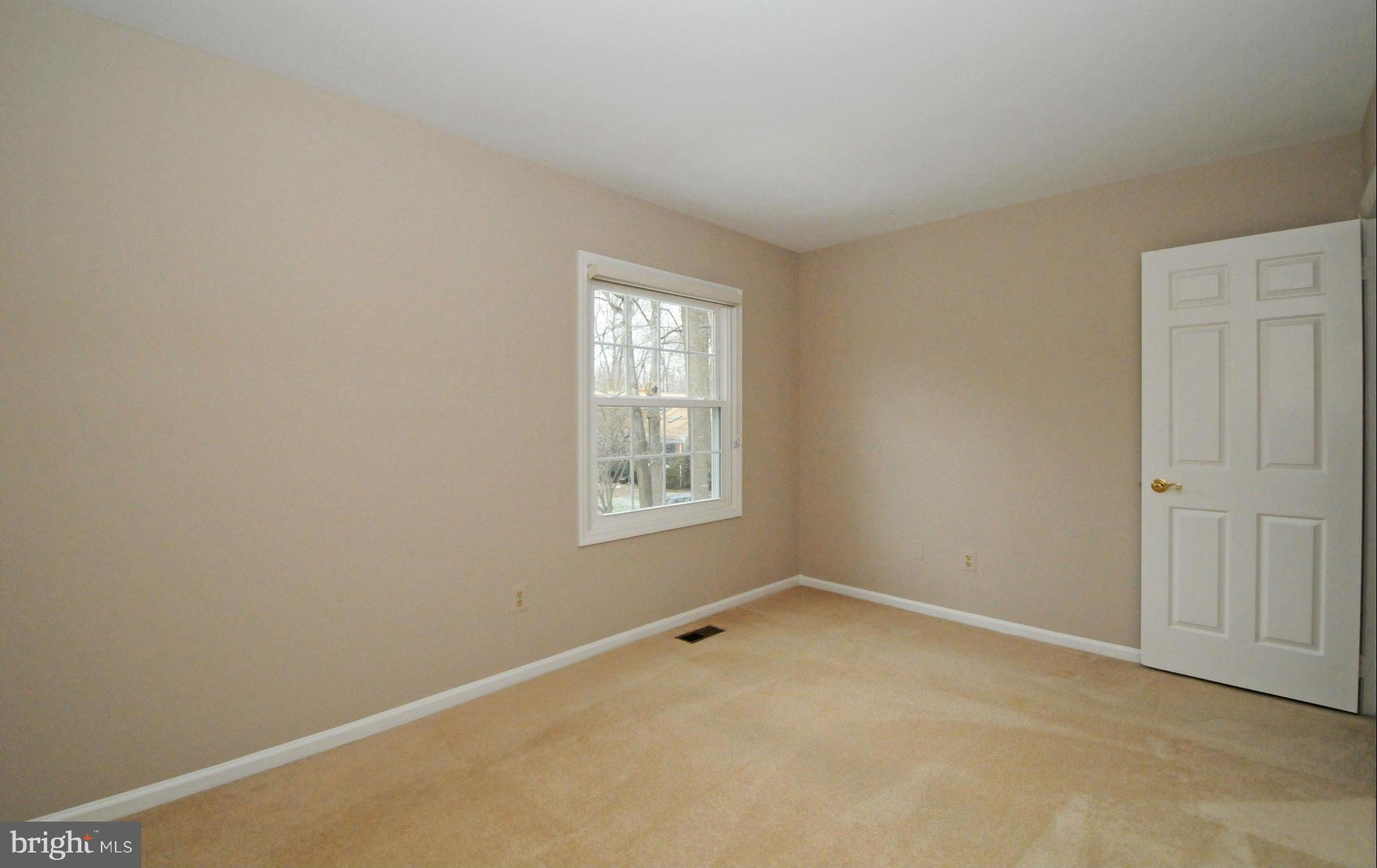 8425 Blevins Way Court Vienna, VA 22182 - Photo 24 of 30 an empty room with a window