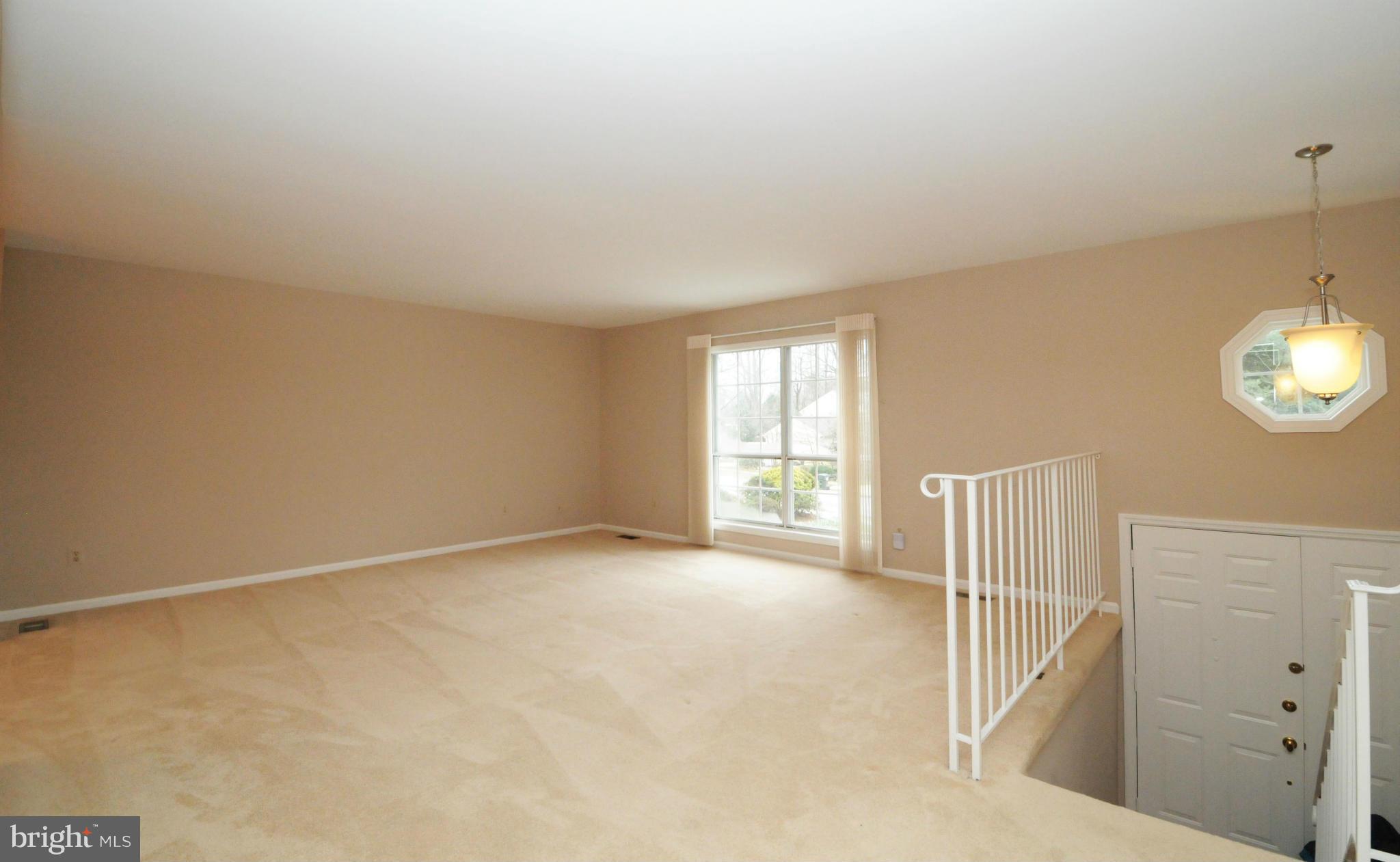 8425 Blevins Way Court Vienna, VA 22182 - Photo 10 of 30 an empty room with windows