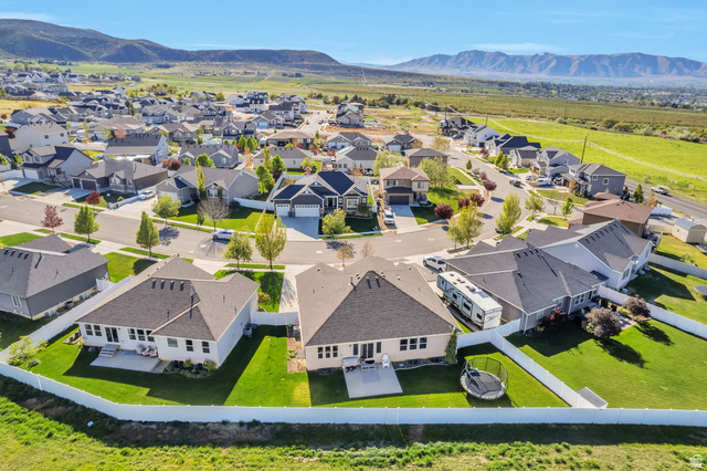 1288 North Horizon View Loop Elk Ridge, UT 84651 - Photo 39 of 40 Aerial view of residential area featuring a mountainous background