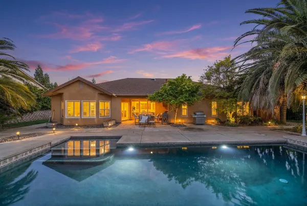 a view of a house with entertaining space