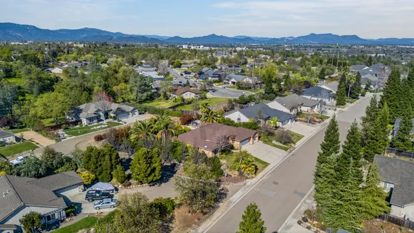 an aerial view of residential house with outdoor space